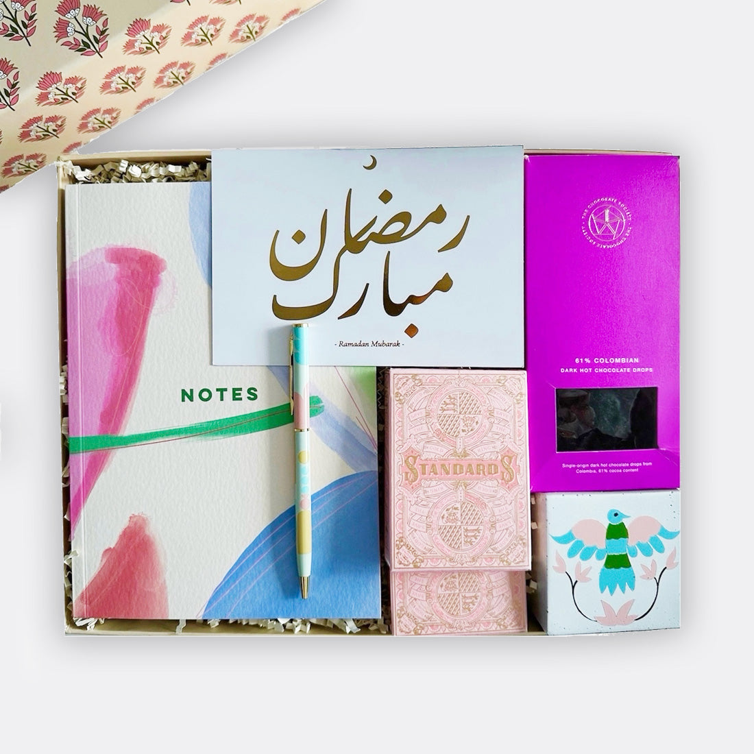 Otomi handpainted mabkhara, 2 Standard Pink Edition Playing Cards, Colombian Dark Hot Chocolate Drops, a Paint Brush Notebook, and a Candy Ballpoint Pen, shop the best ramadan gift gifts for her for him from Inna carton online store dubai, UAE!
