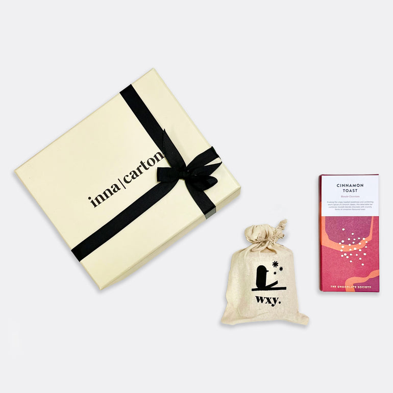 Cinnamon Toast Blonde Chocolate Bar Amber Crisp Apple Winter Lily & Spruce Candle, shop the best Christmas gift gifts for her for him from Inna carton online store dubai, UAE!