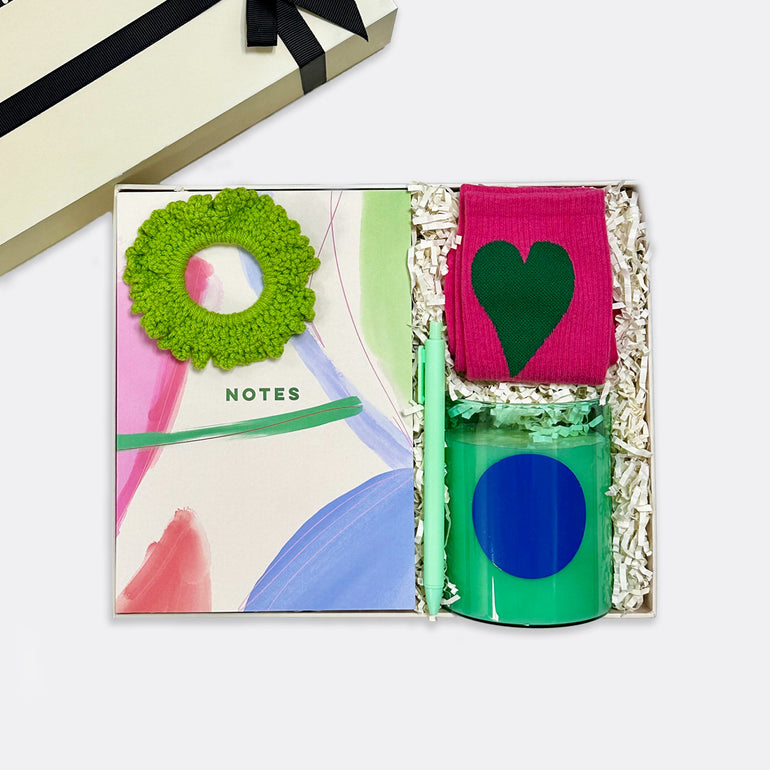 Paint Brush Notebook Knitted Hair Scrunchy | Green Disco Candle | Basil And Sweet Lime Heart Socks | White (fits 36-41) Gel Pen | Mint, shop the best Christmas gift gifts for her for him from Inna carton online store dubai, UAE!