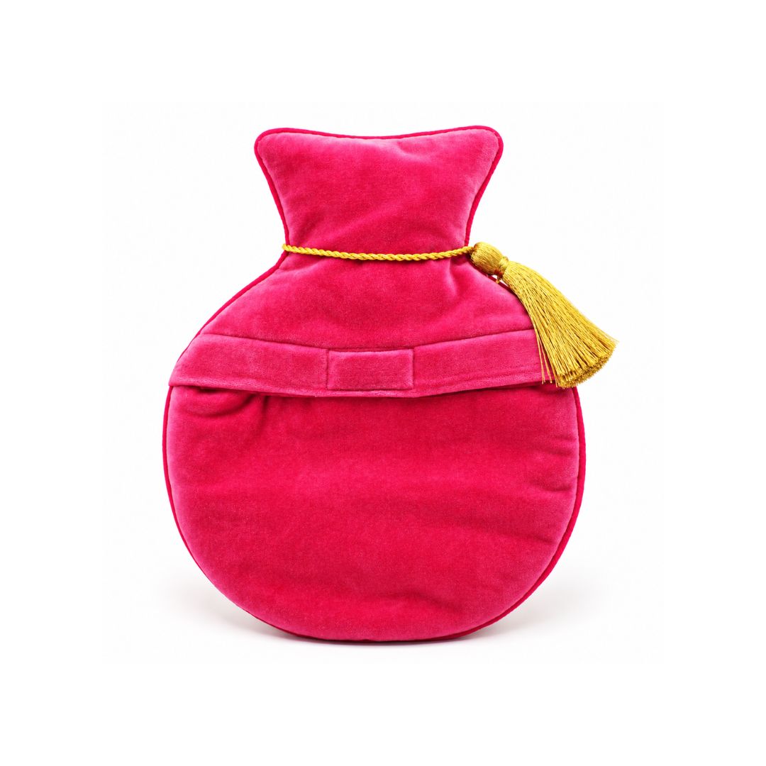 A hot water bottle cover in bright pink velvet with a gold tassel and cord, the best customized gift and gifts for her and for him from Inna Carton online shop Dubai, UAE!

